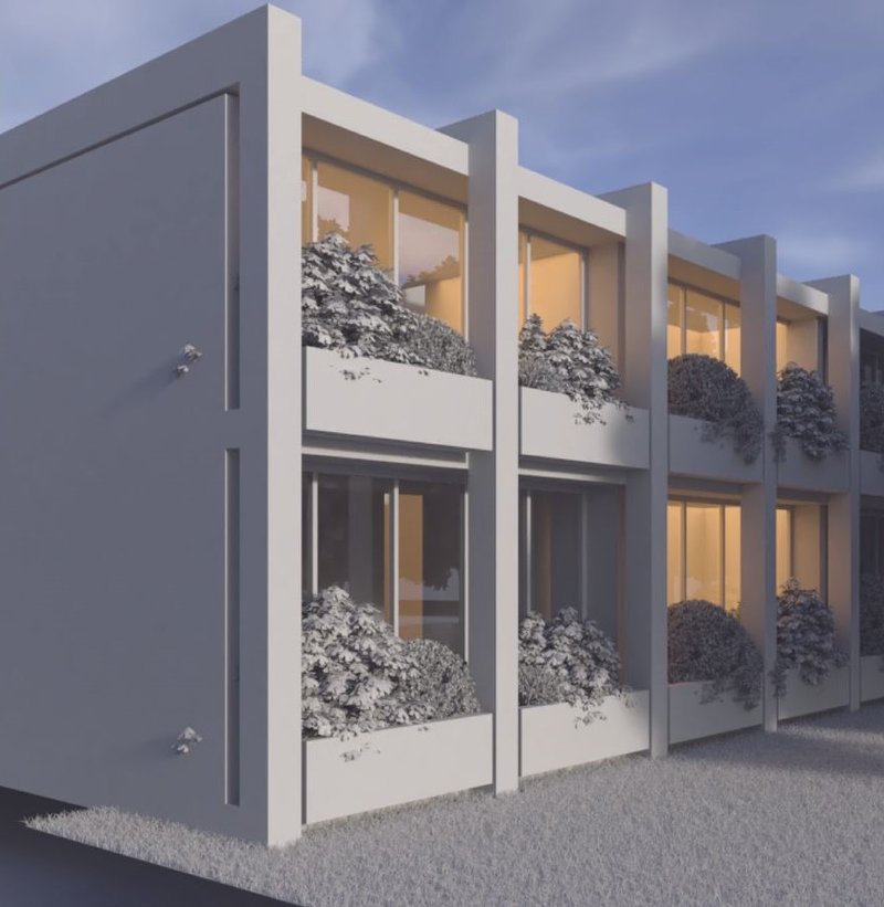 Modern facade with integrated greenery elements.