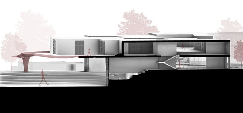 Building section illustrating open workspace with ramp access.