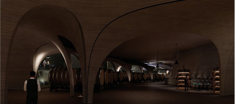 Underground wine cellar with arching concrete ceilings.