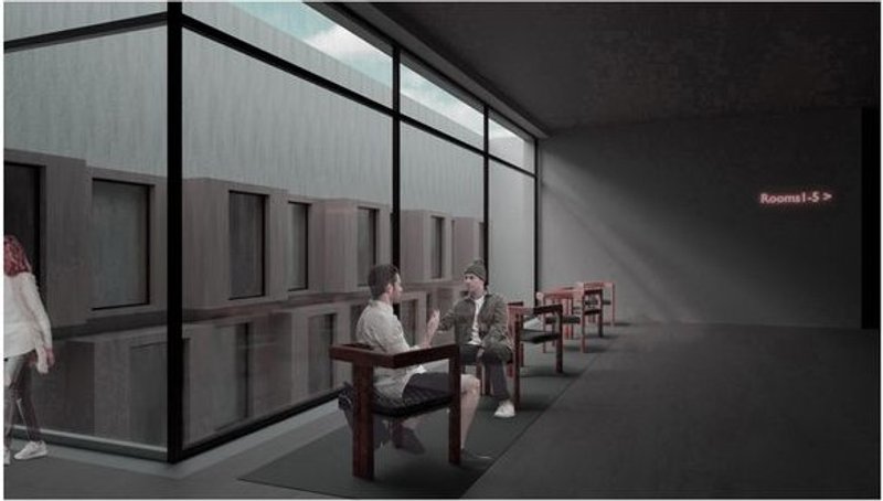 Indoor seating area with view of the light courtyard.