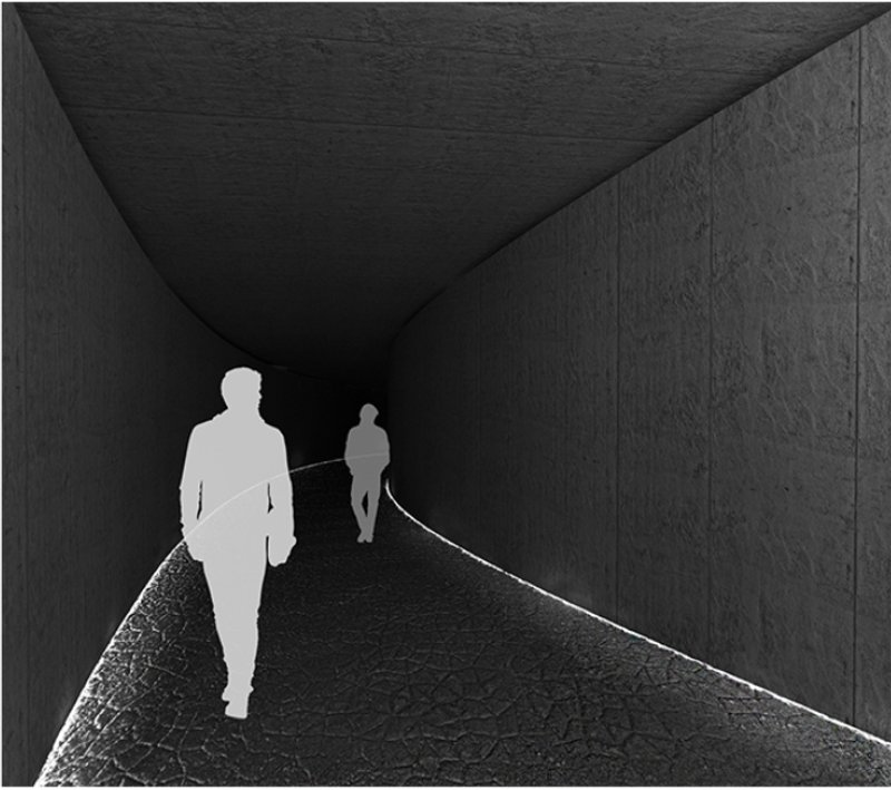 Visitors journey through a dimly lit concrete tunnel, emphasizing solitude and introspection on the path of remembrance.