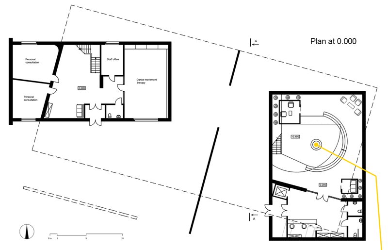 Ground level layout featuring consultation rooms and dance-movement therapy area designed for focused interaction.