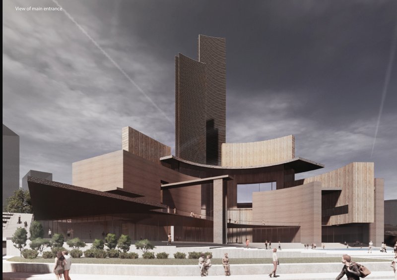 The monumental entrance reflects the integration of civic and sacred architecture within a dense urban fabric.