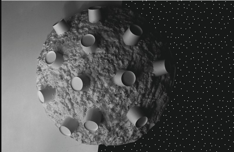 Physical model of Apollo 20 showcasing crater forms and cosmic orientation.