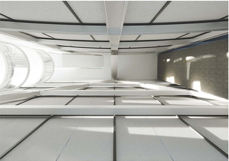 View from the base, looking upward through the layered interior revealing light, materiality, and geometry.