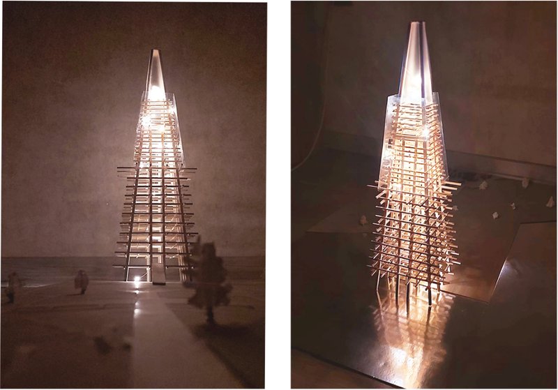 The glowing physical model symbolizes the Port Tower as a lighthouse of social cohesion and urban regeneration.