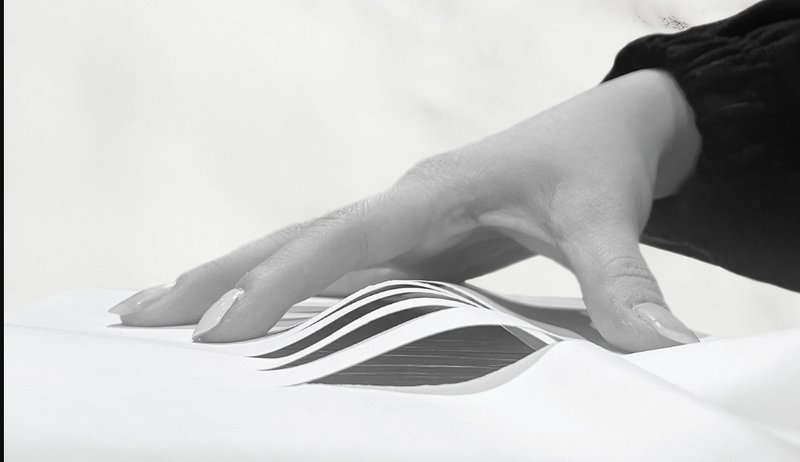 A tactile exploration showing the roof form as a cut through layered earth, symbolic of human intervention.