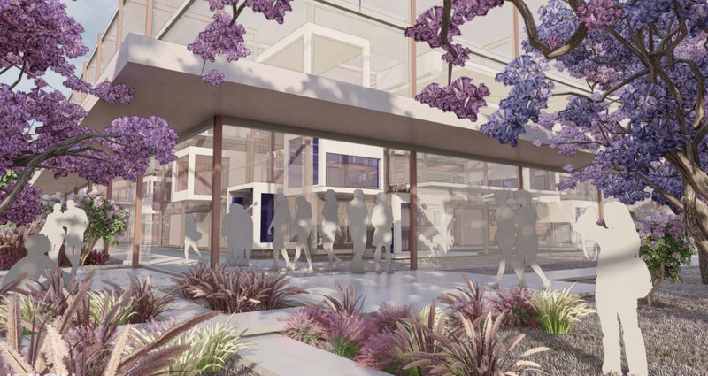 Inviting entrance framed by transparent facades and flowering landscapes, blending architecture with nature.