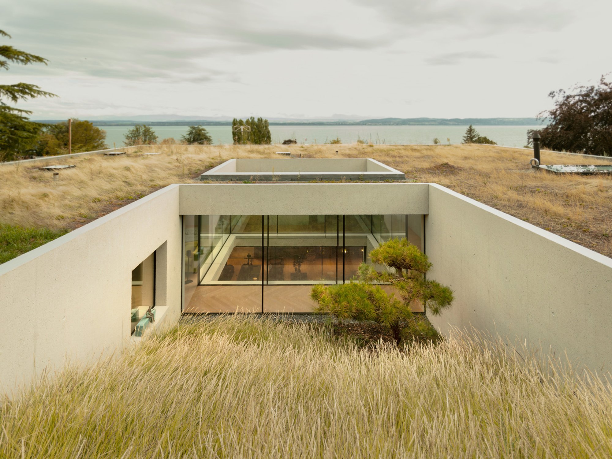 Concrete House on a Slope: Villa BEC by Andrea Pelati Architecte
