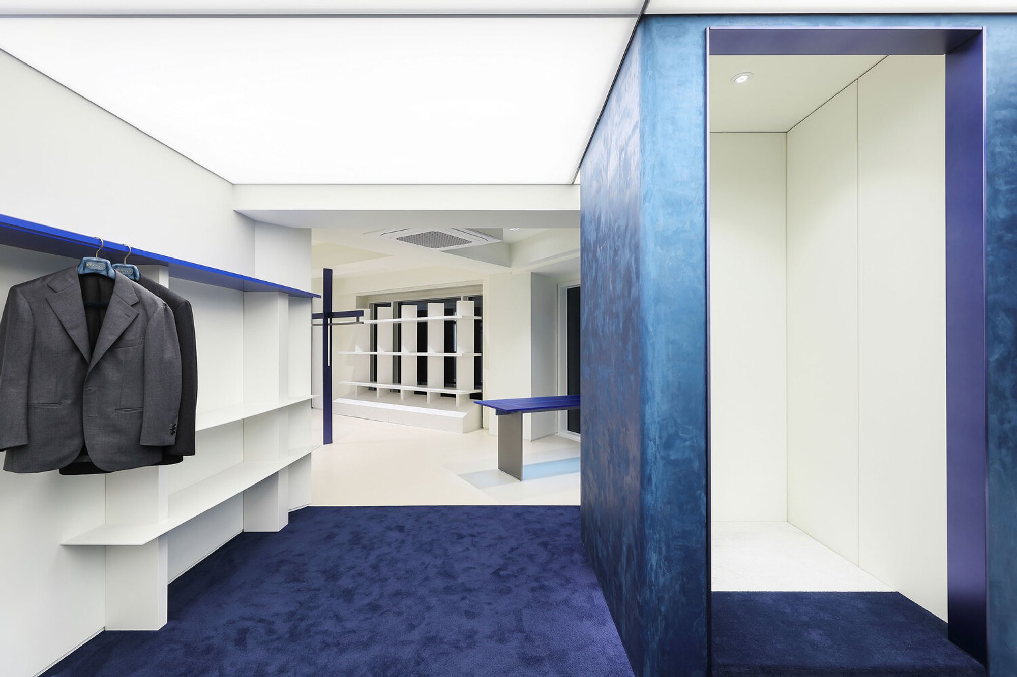 Tailor Showroom Interior Design: PAVONE by Design Studio Maoom Transforms Retail Into Artistic Discovery