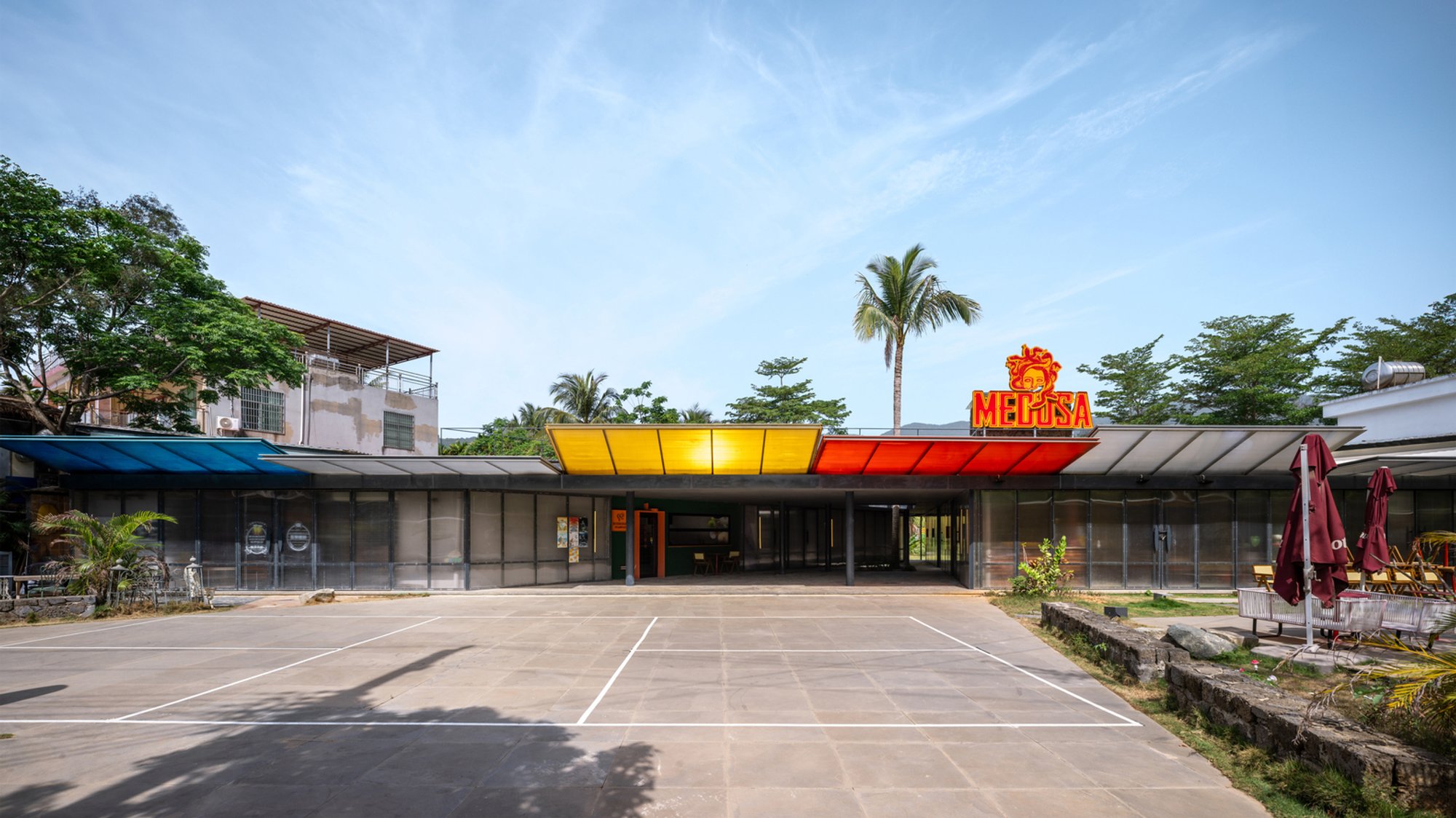 Surf Community Architecture: Earth-Hugging Duke Plaza by Edge Architects