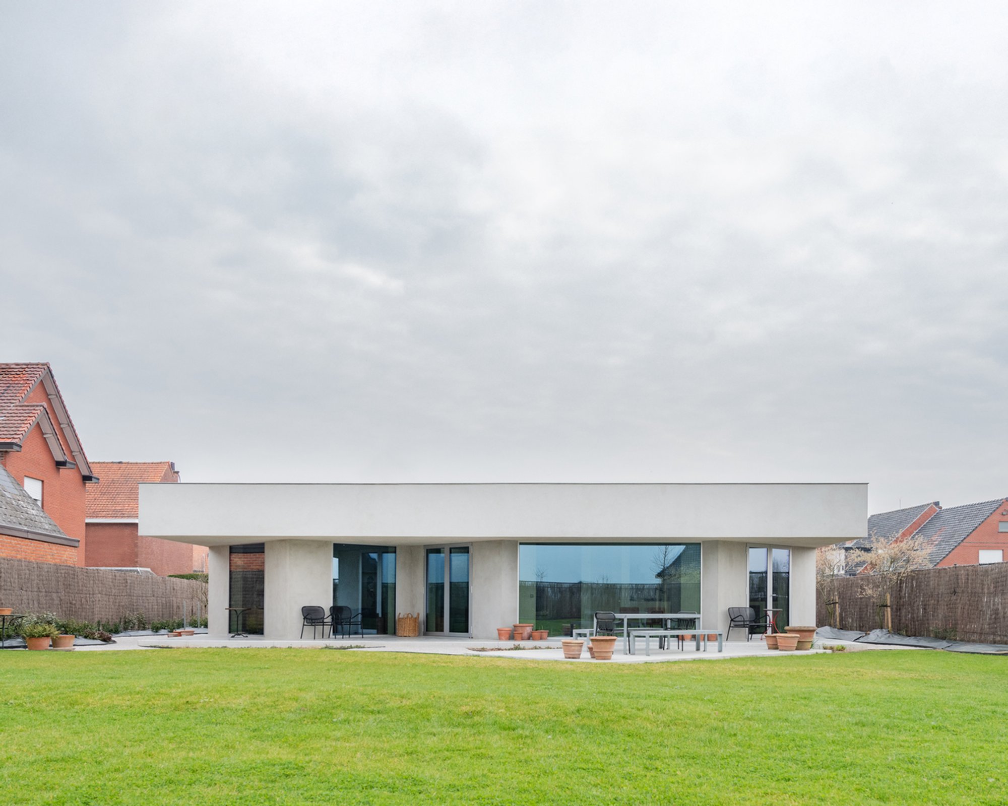 45° Grid House: A Contemporary Concrete House Design by Objekt Architecten