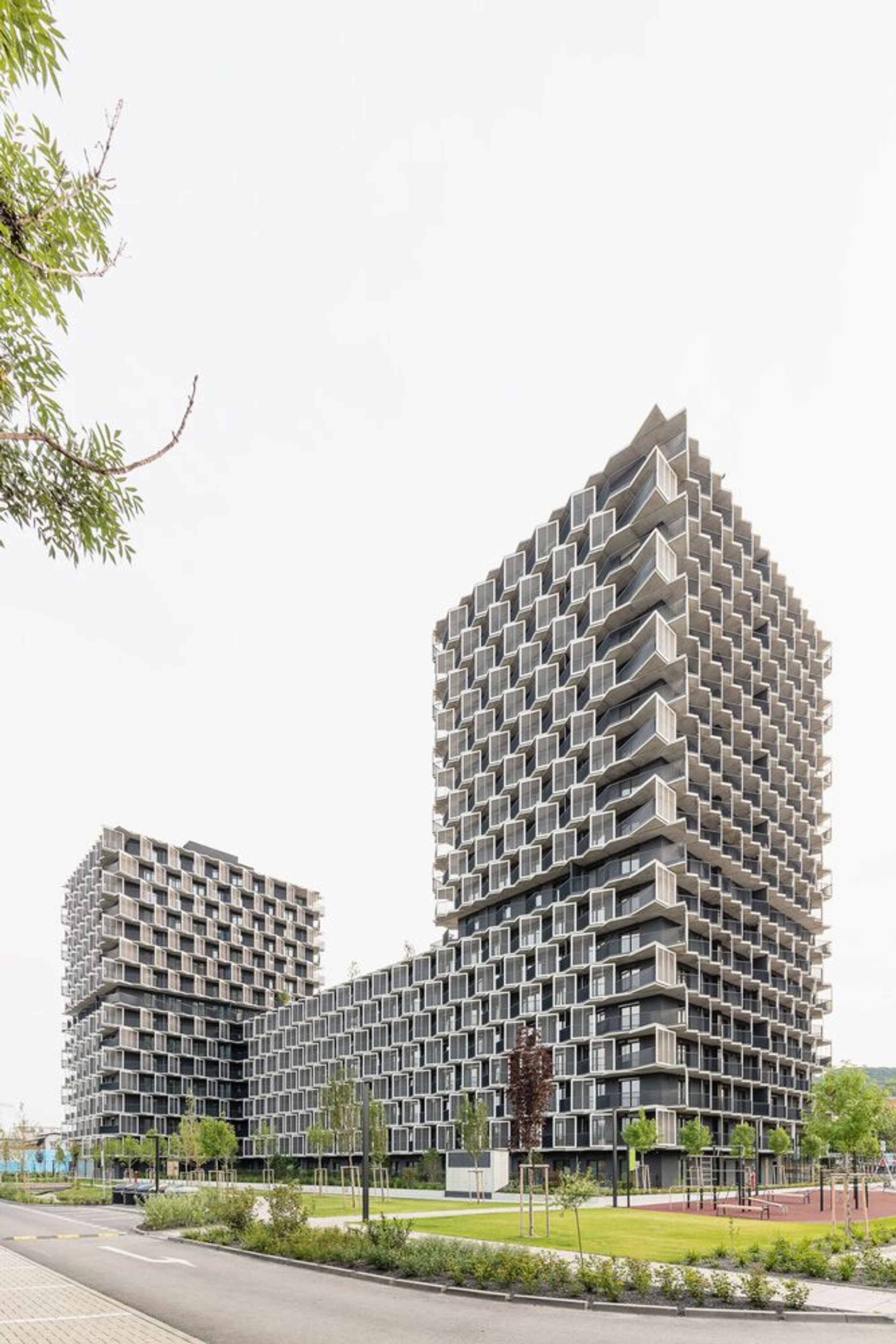 Guthaus by AllesWirdGut Architektur: A Vertical Community Hub in Bratislava