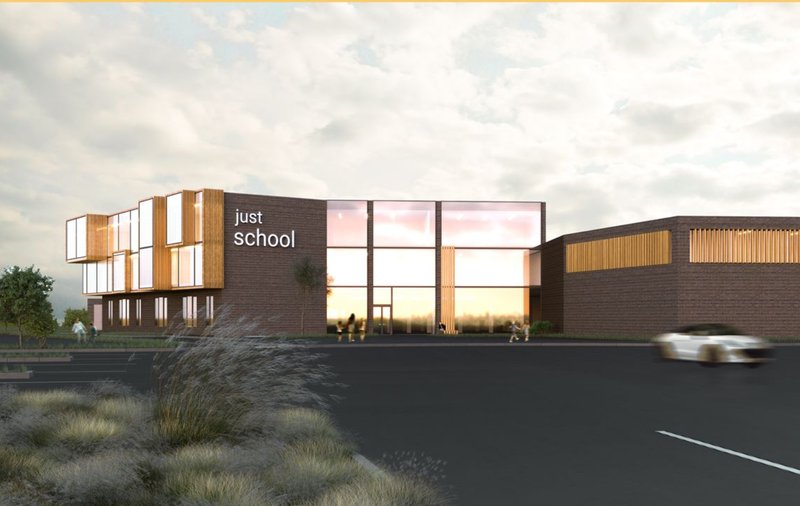 A welcoming front facade featuring warm materials and transparent design that invites community interaction.