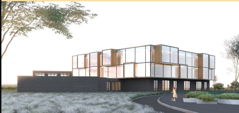 A dynamic rear elevation showcasing modular glass forms and lush landscaping.
