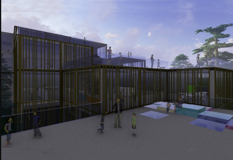 An atmospheric view of the school’s cube volumes, where illuminated classrooms and roof terraces enhance evening activity.