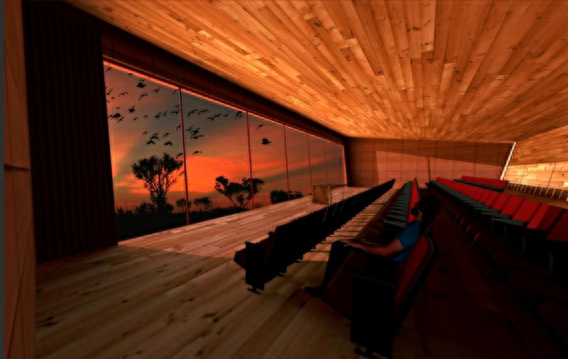 Auditorium with timber ceiling and seating rows facing a projection screen showing sunset silhouettes of birds and trees