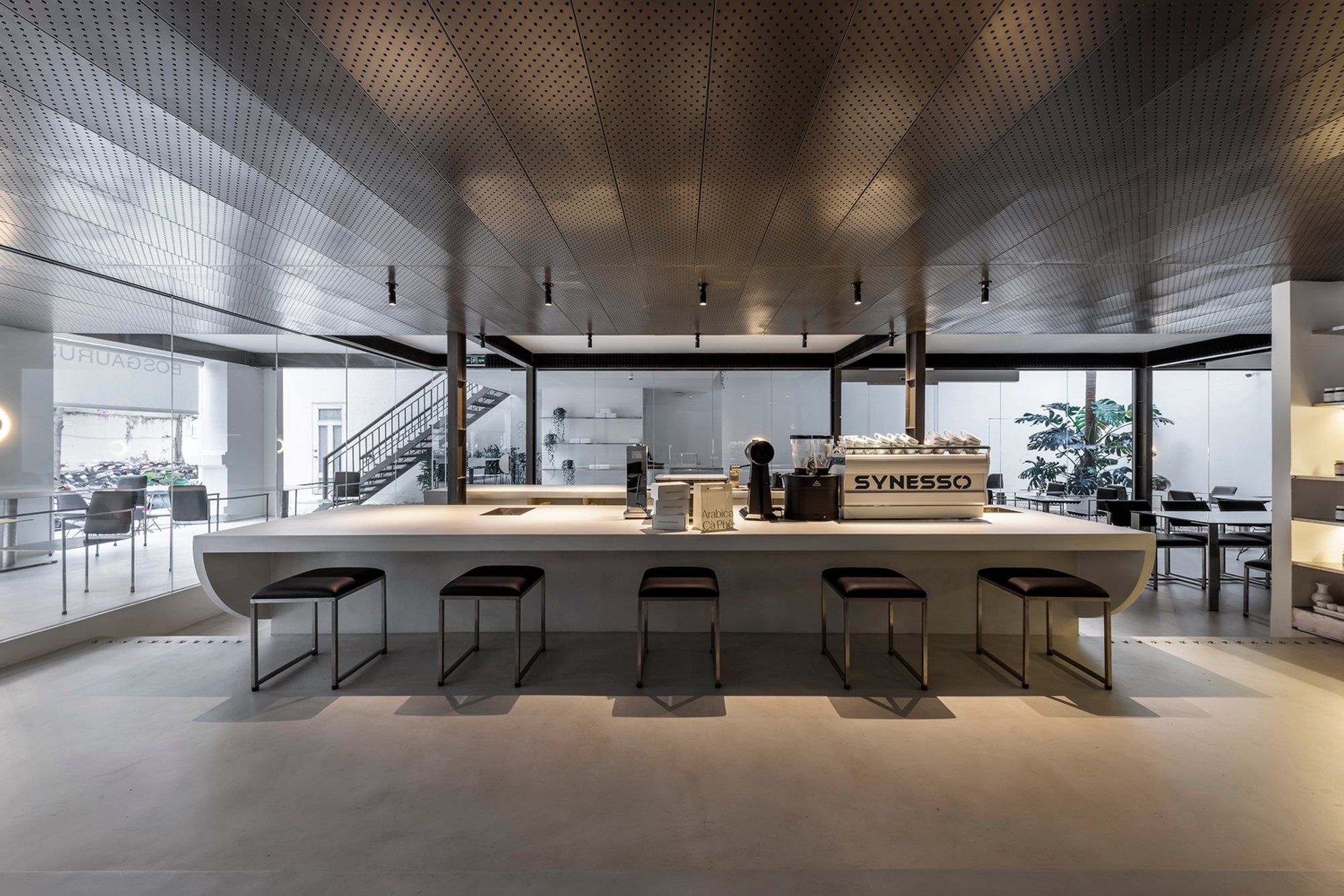 Bosgaurus Coffee Roasters by NU Architecture & Design: A Minimalist Stage for Vietnamese Coffee Craftsmanship