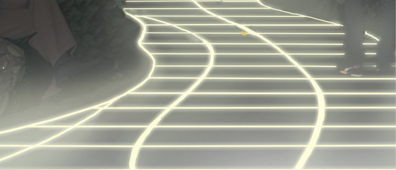 Glowing pathway enhances night visibility while guiding users through a tactile, immersive green space.