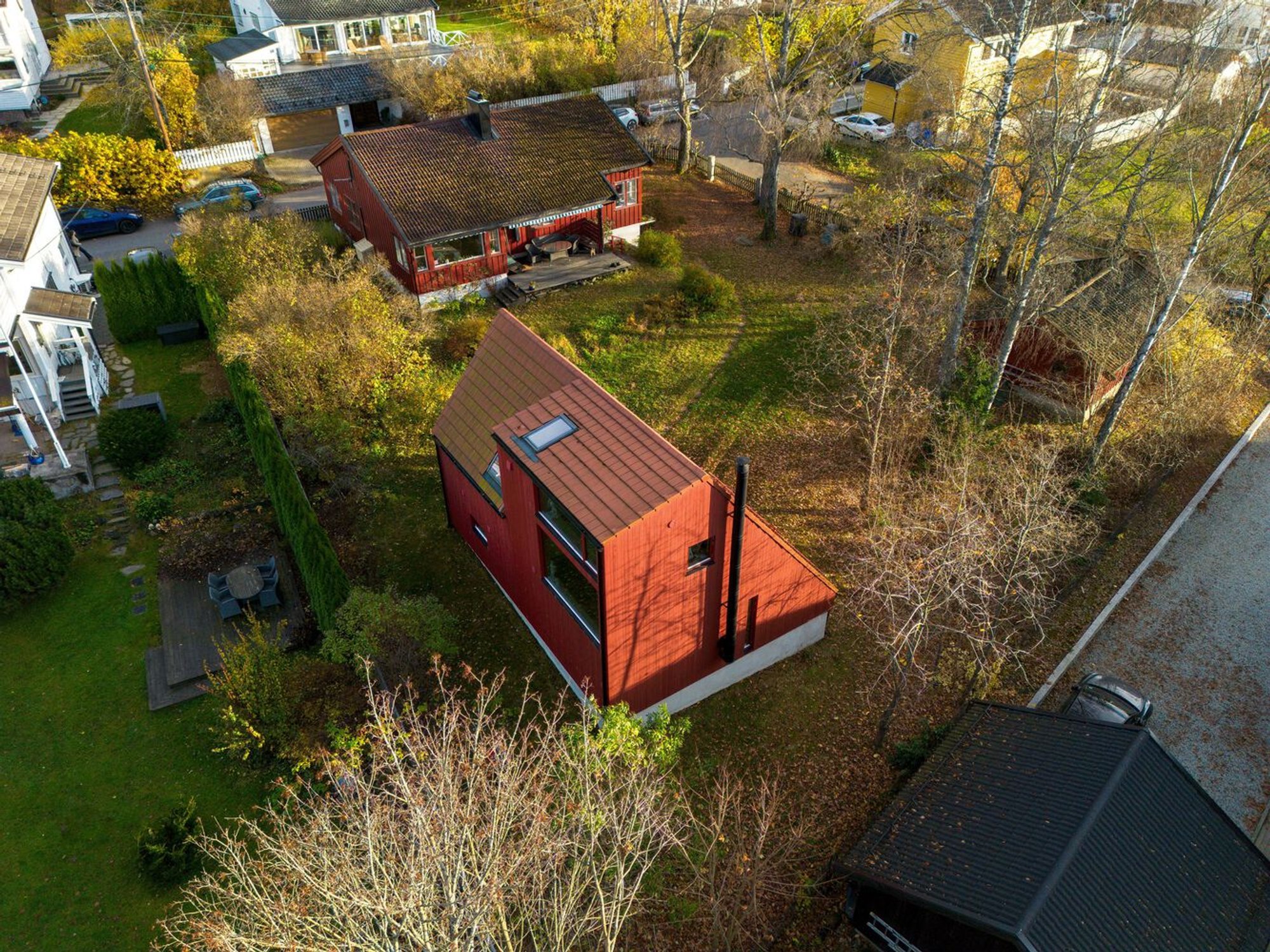 The Red House by MORFEUS arkitekter: A Compact Studio House Design Merging Creativity and Functionality