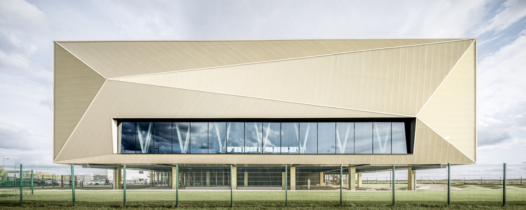 Nikola Karabatic Sports Complex: A Golden Icon of Modern Sports Complex Architecture in France