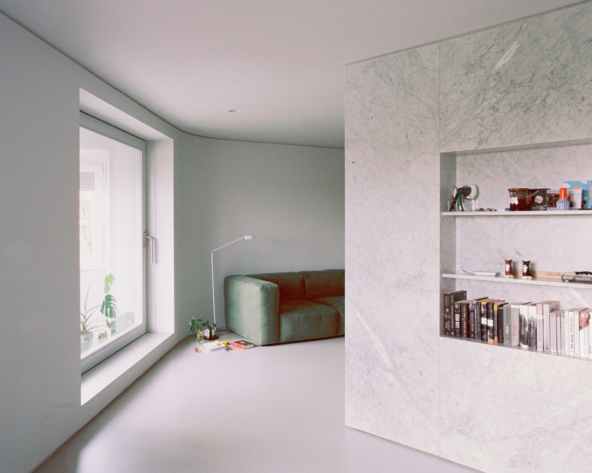 Apartment Barjanska by Arhitekti Počivašek Petranovič: A Modern Apartment Renovation Rooted in Material Simplicity