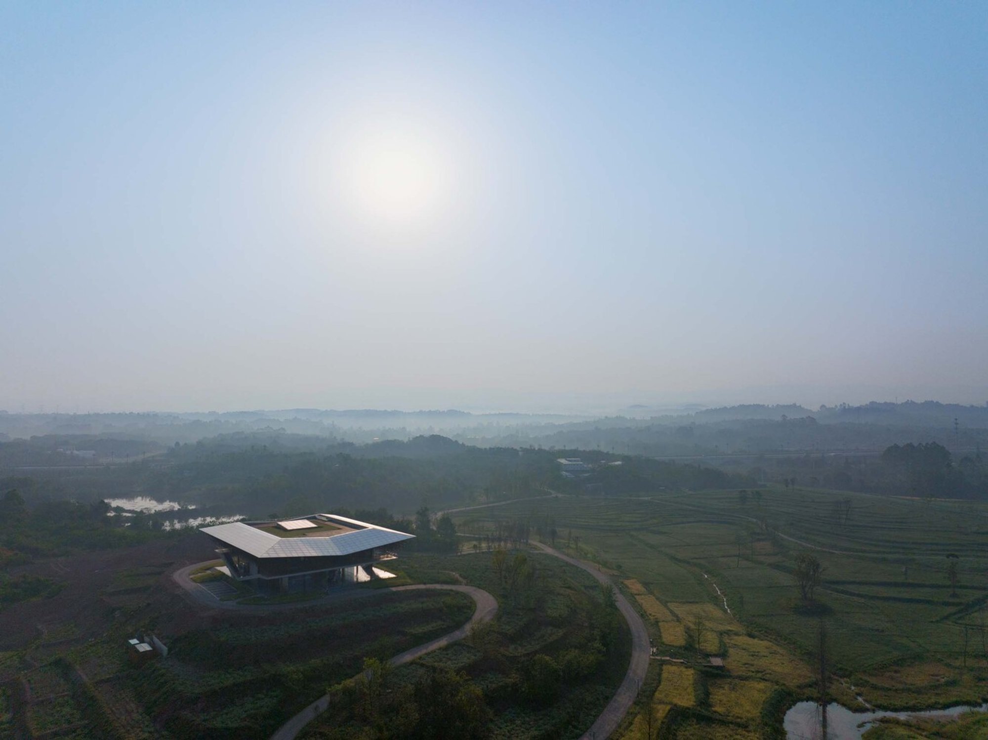 Chengdu Tianfu City Planning Hall by AND Studio: A Feathered Landmark in the Wetlands of Tianfu New Area