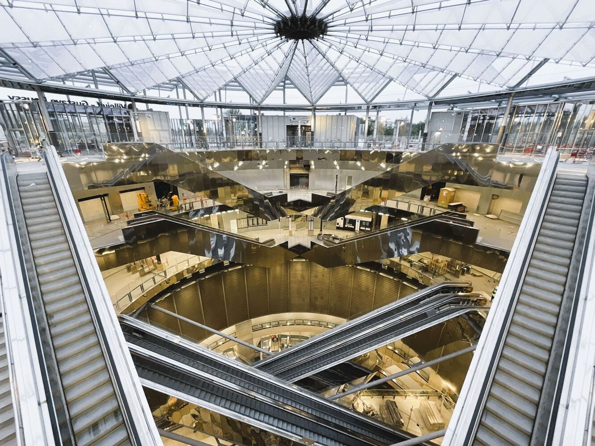 Dominique Perrault Sinks an Inverted Skyscraper Fifty Meters into the Earth Outside Paris