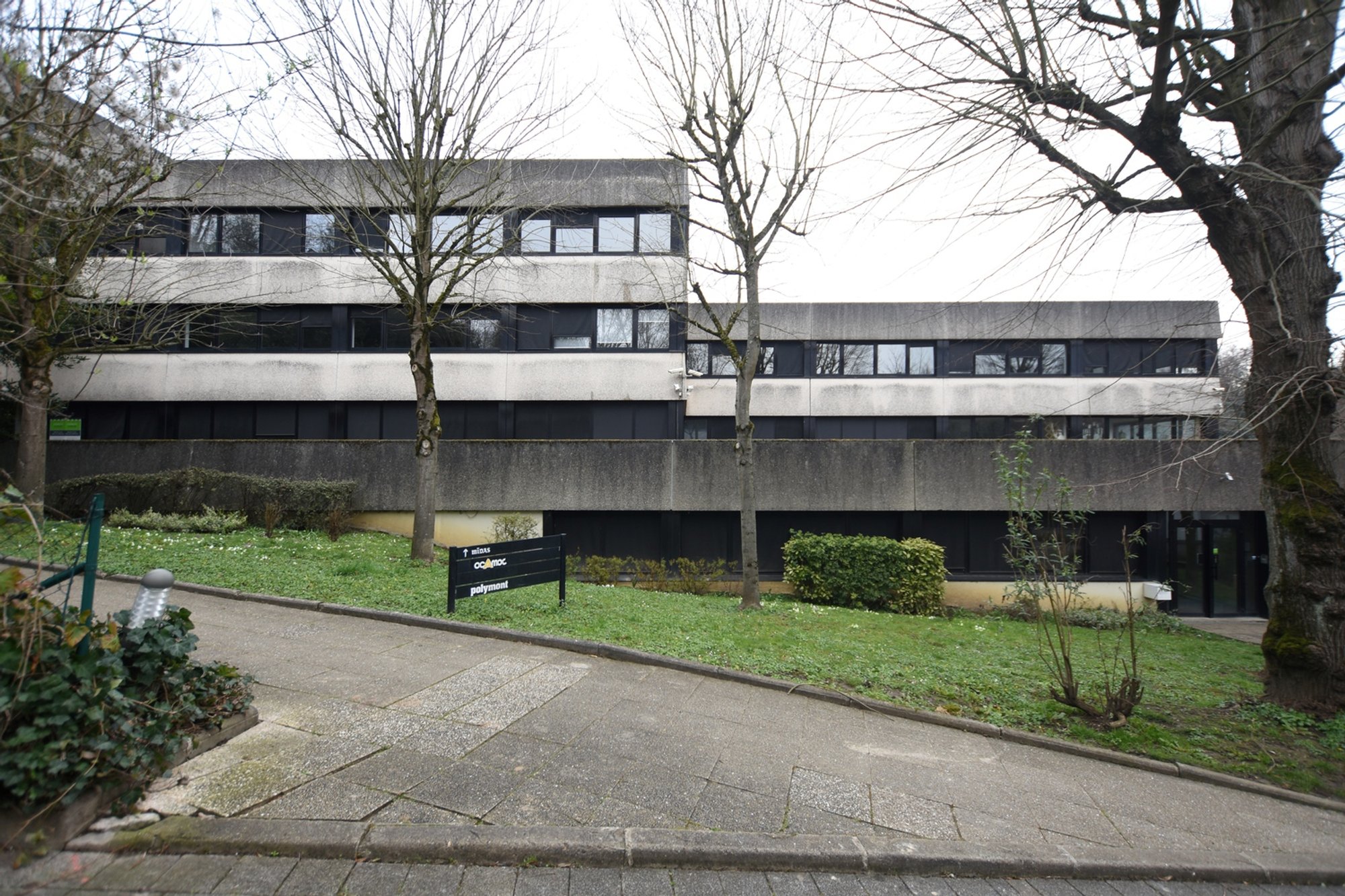 Office Building Conversion to Residential in France: Jean Moulin Building by AZC Architects