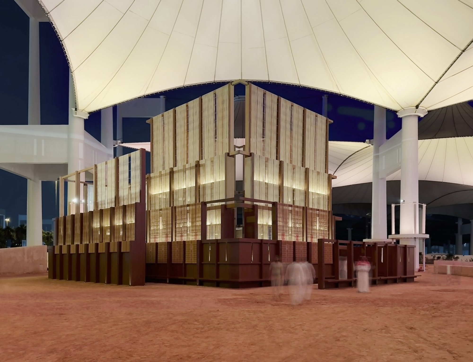 East Architecture Studio Weaves a Carbon-Negative Prayer Pavilion from 150 Date Palm Trees
