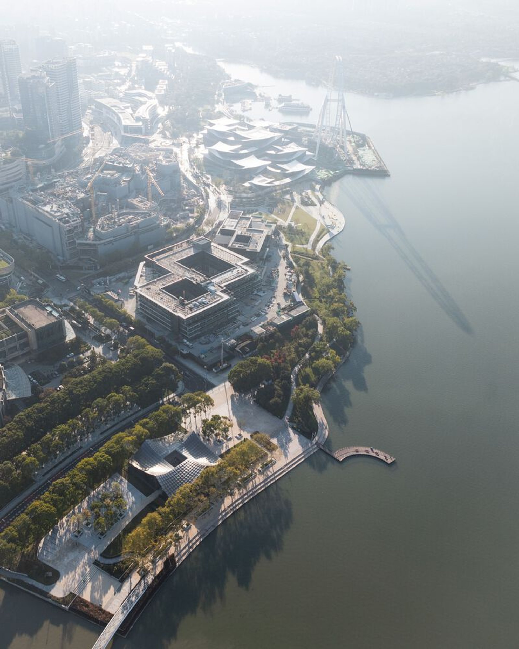 BIG Wraps Four Public Rooms Under a Pixelated Glass Canopy on Suzhou's Jinji Lake