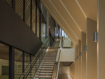 Nikken Sekkei Carves Diagonal Atriums Through a Tokyo Office to Let the Building Breathe