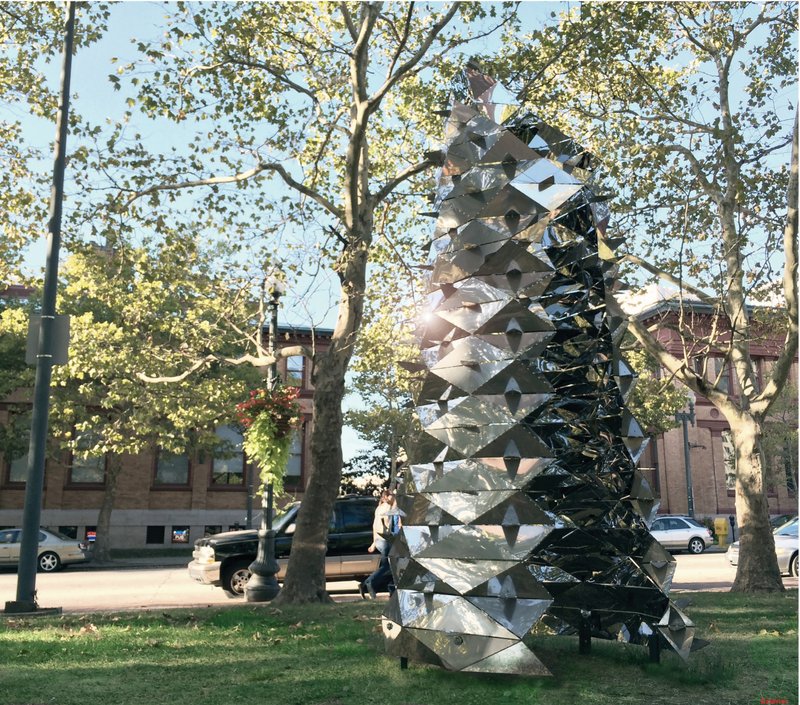 Daylight Interaction – Sunlight bouncing off the geometric facets of the installation.