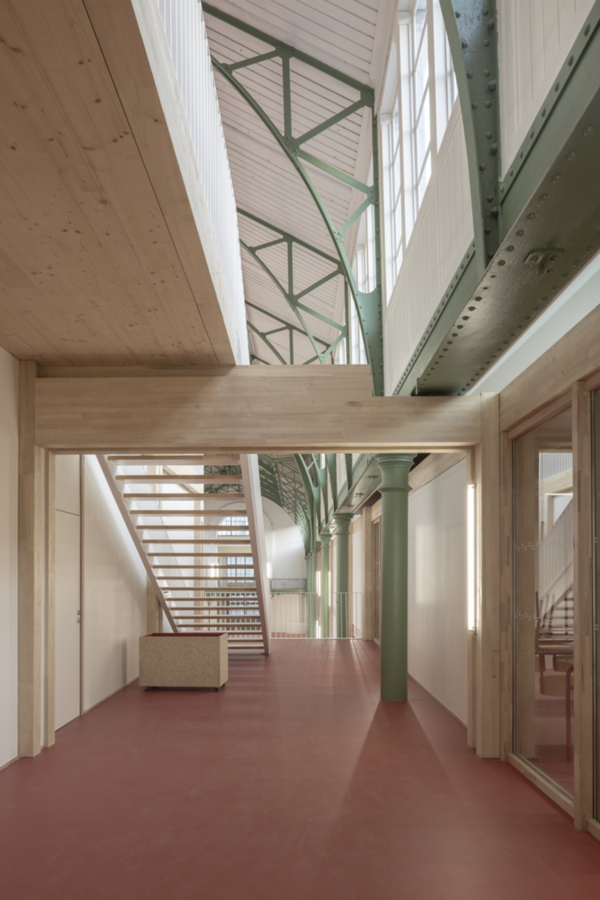 Atelier 9.81 Threads a Fully Reversible Timber Campus into Lille's 1878 Palais Rameau