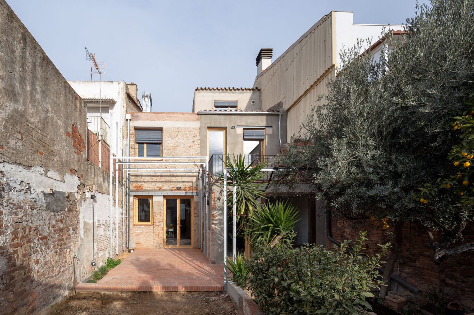 Renovation of Two Historic Houses Between Party Walls | Arqbag