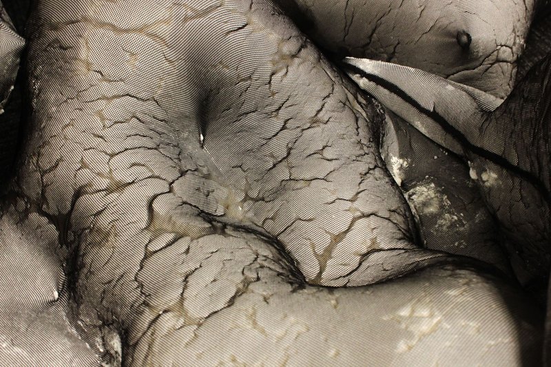 Textured Close-Up – A detailed view of the organic, cracked texture of the installation.