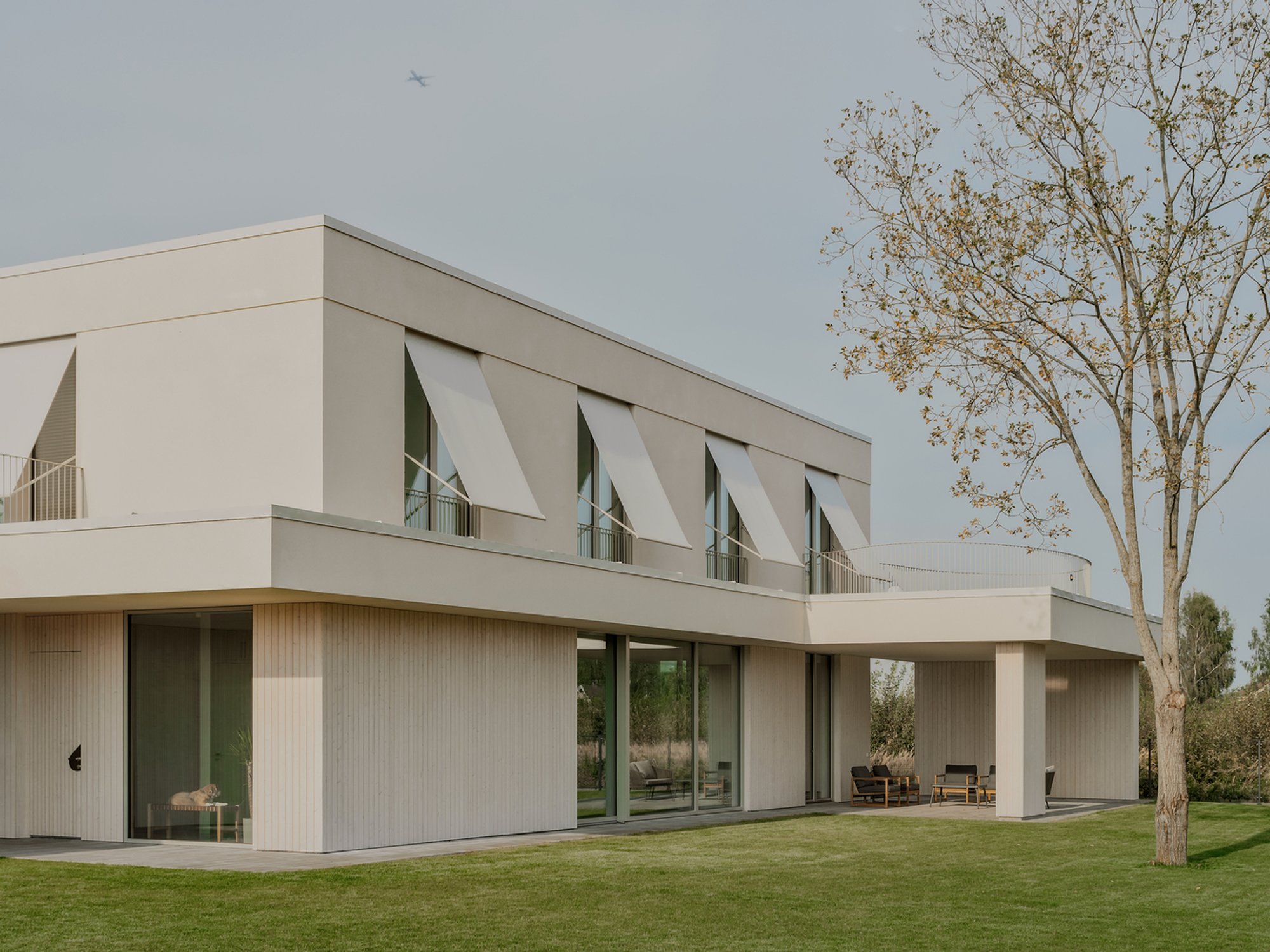 Sustainable Timber House Design: Lime and Timber House by GAISS in Latvia