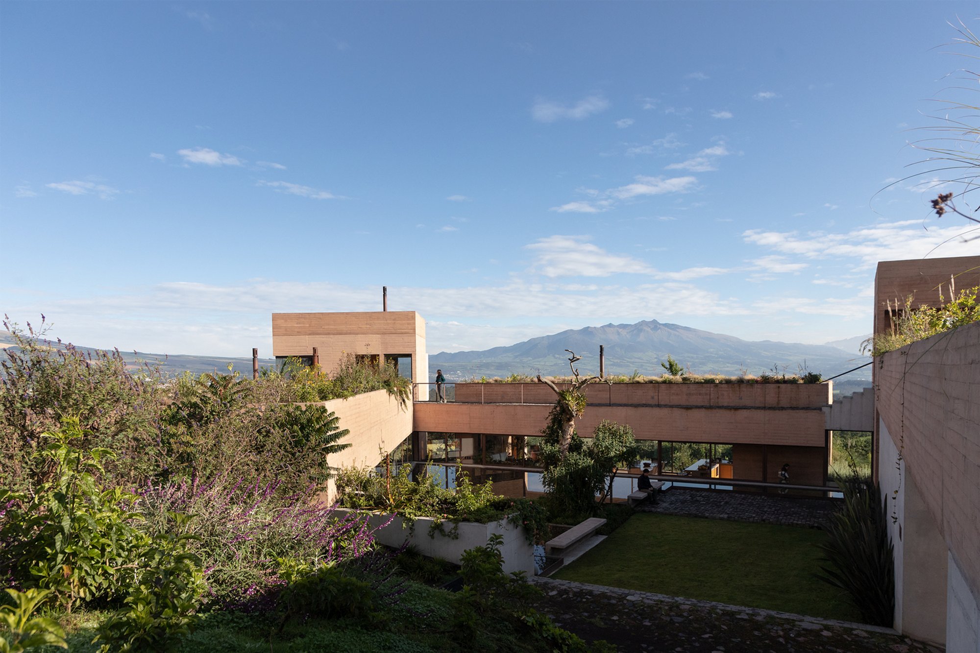 Diez + Muller Arquitectos Fan Four Concrete Volumes Across an Ecuadorian Hillside