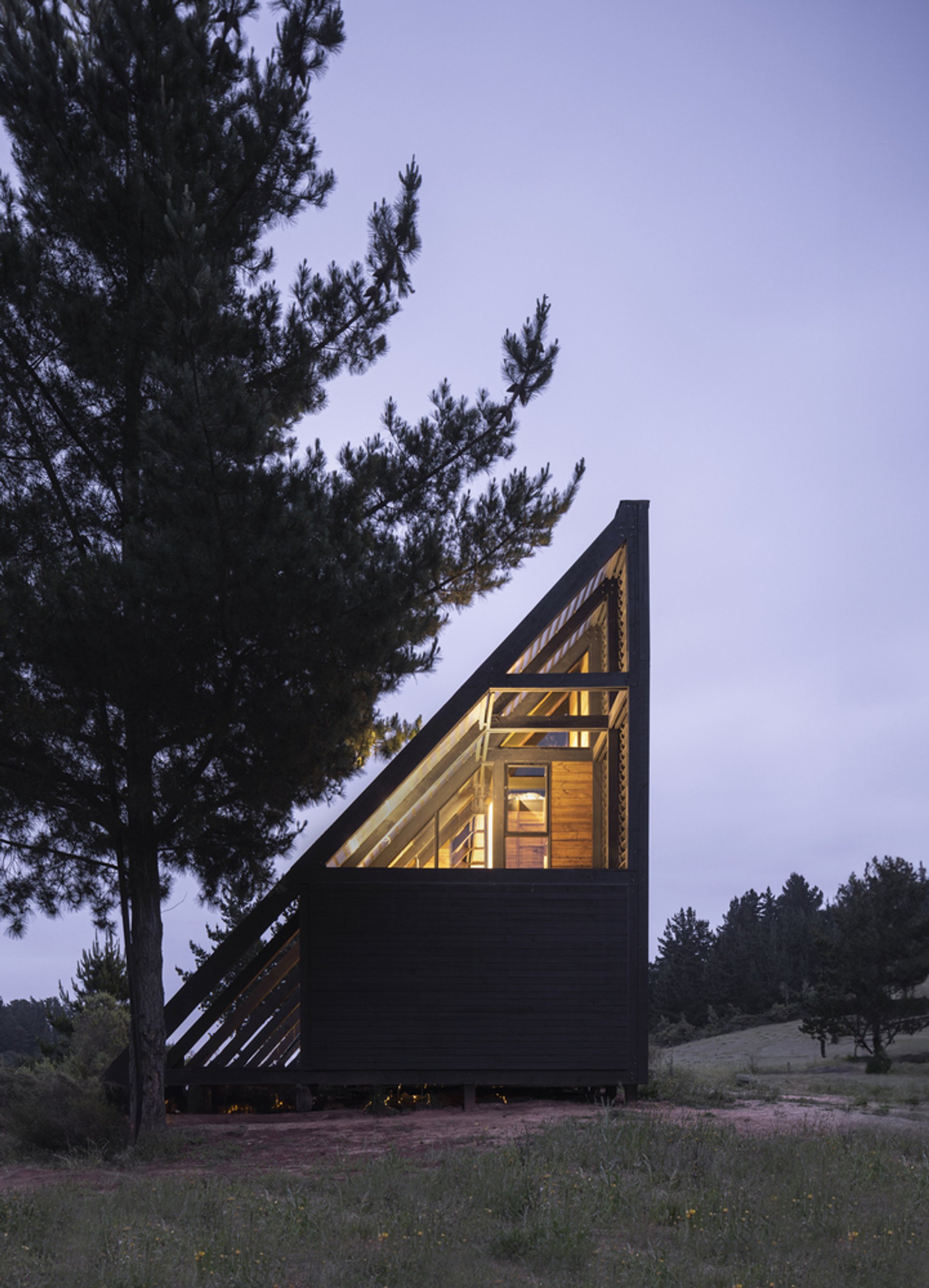 Gonzalo Rufin Arquitectos and Felipe Toro Stack a Wind-Battered Cabin Vertically on a Chilean Hillside