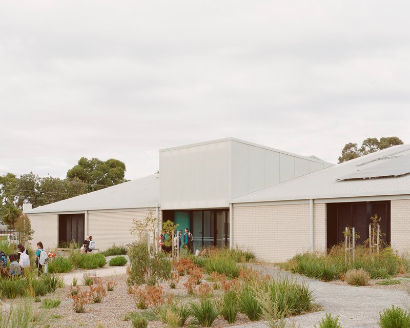 Meadows Primary School — classroom clusters that open directly onto outdoor learning gardens