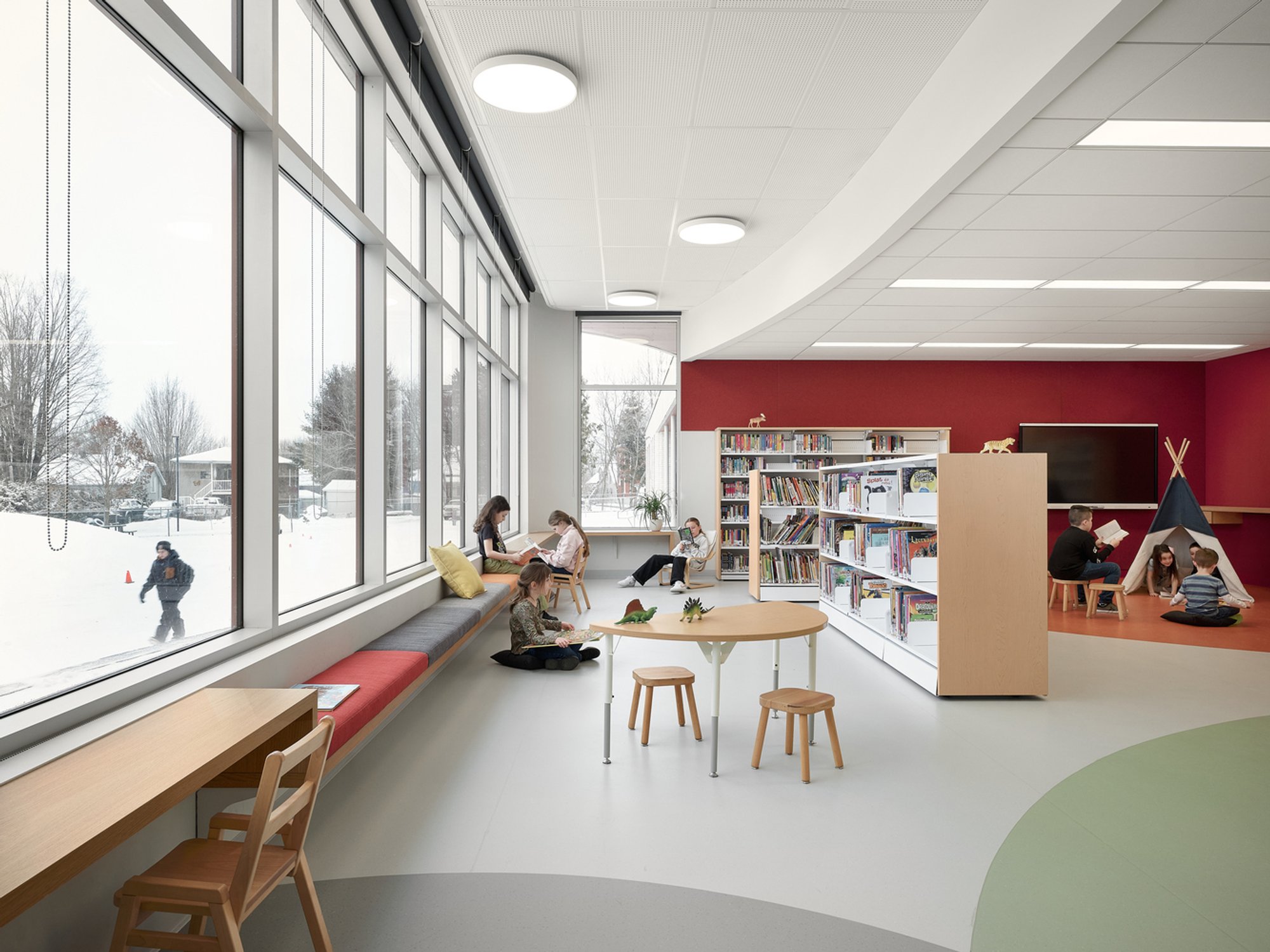 STGM and Ateliers Architecture Wrap a 1959 Québec School in Curves and Clay Brick