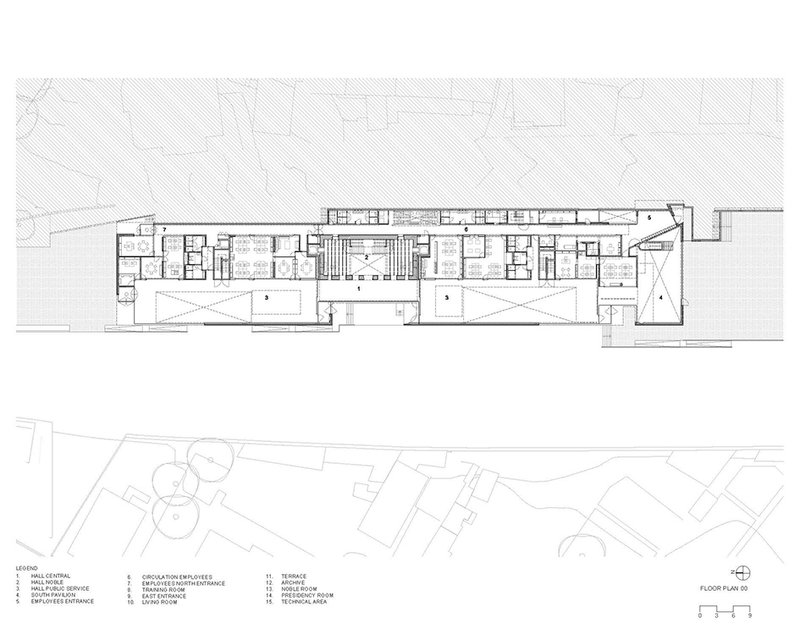 Floor plan drawing showing symmetrical wings with courtyard voids flanking a central hall