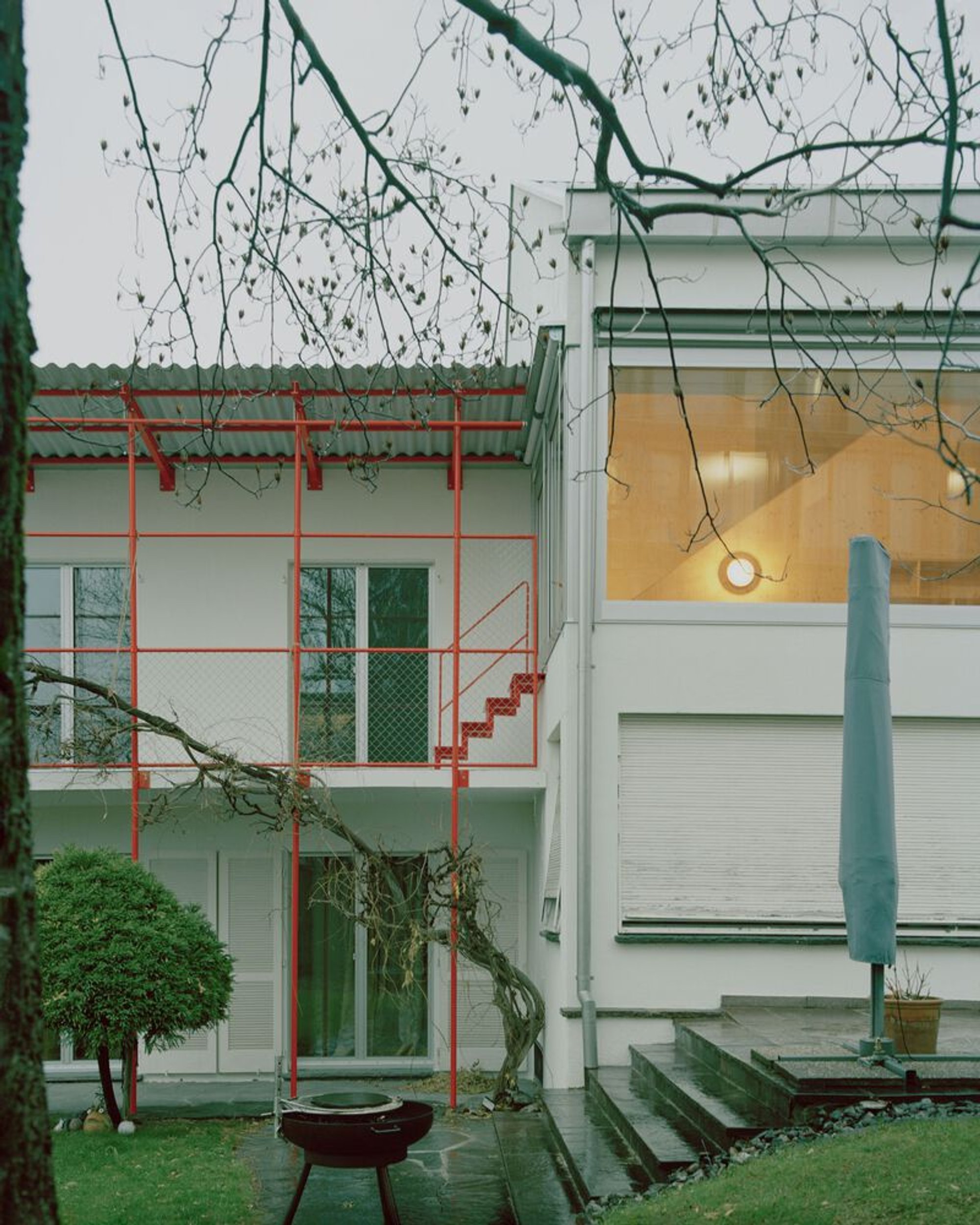 Dominic Spalt Architektur Threads a Red Steel Skeleton Through a 1960s House in Liechtenstein