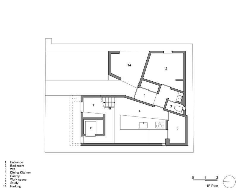 First floor plan drawing showing angled walls organizing entrance, bedroom, kitchen and central courtyard