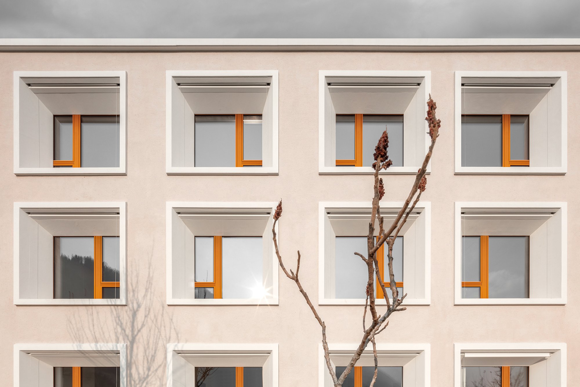 Pedevilla Architects Wrap a 1980s Nursing Home in a Monastic Facade in the South Tyrolean Alps
