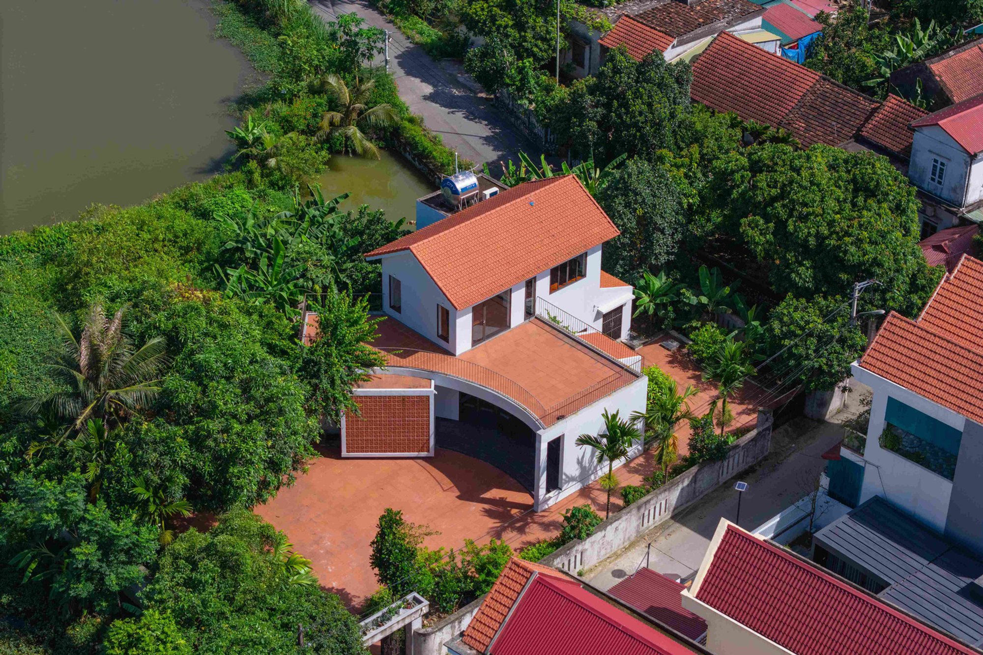 Modern Rural House Design: Xom Me House by NH Village Architects in Vietnam