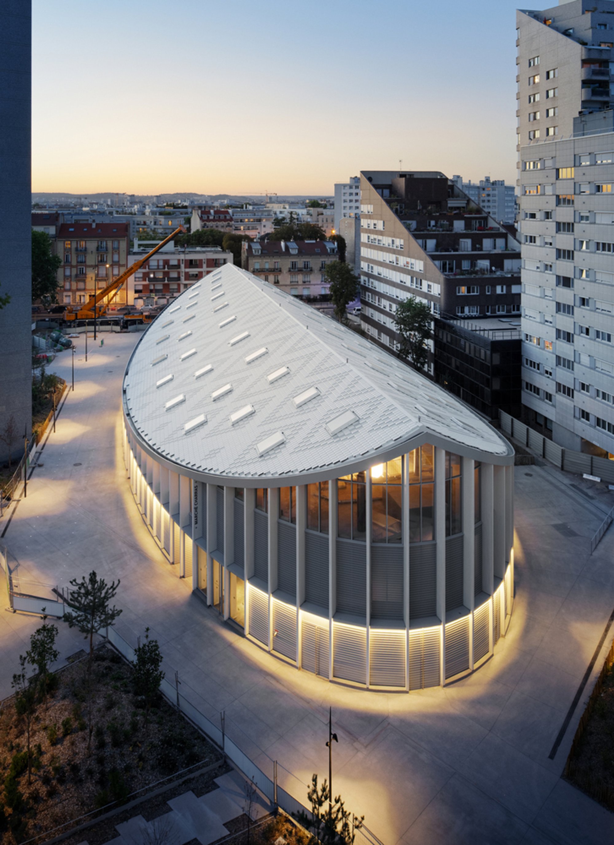 croixmariebourdon Wraps Courbevoie's New Market Hall in an Elliptical Timber Shell