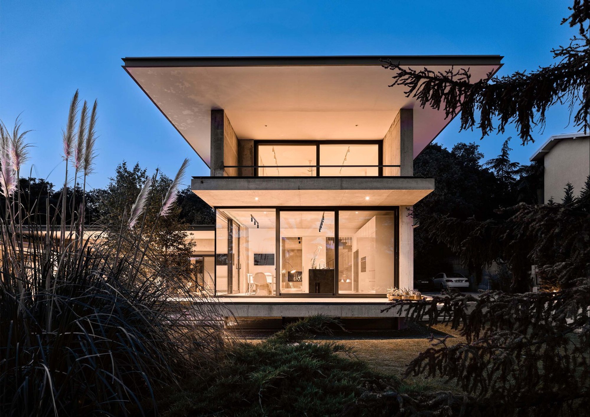 Sustainable Concrete House Design: Can House by PIN Architects