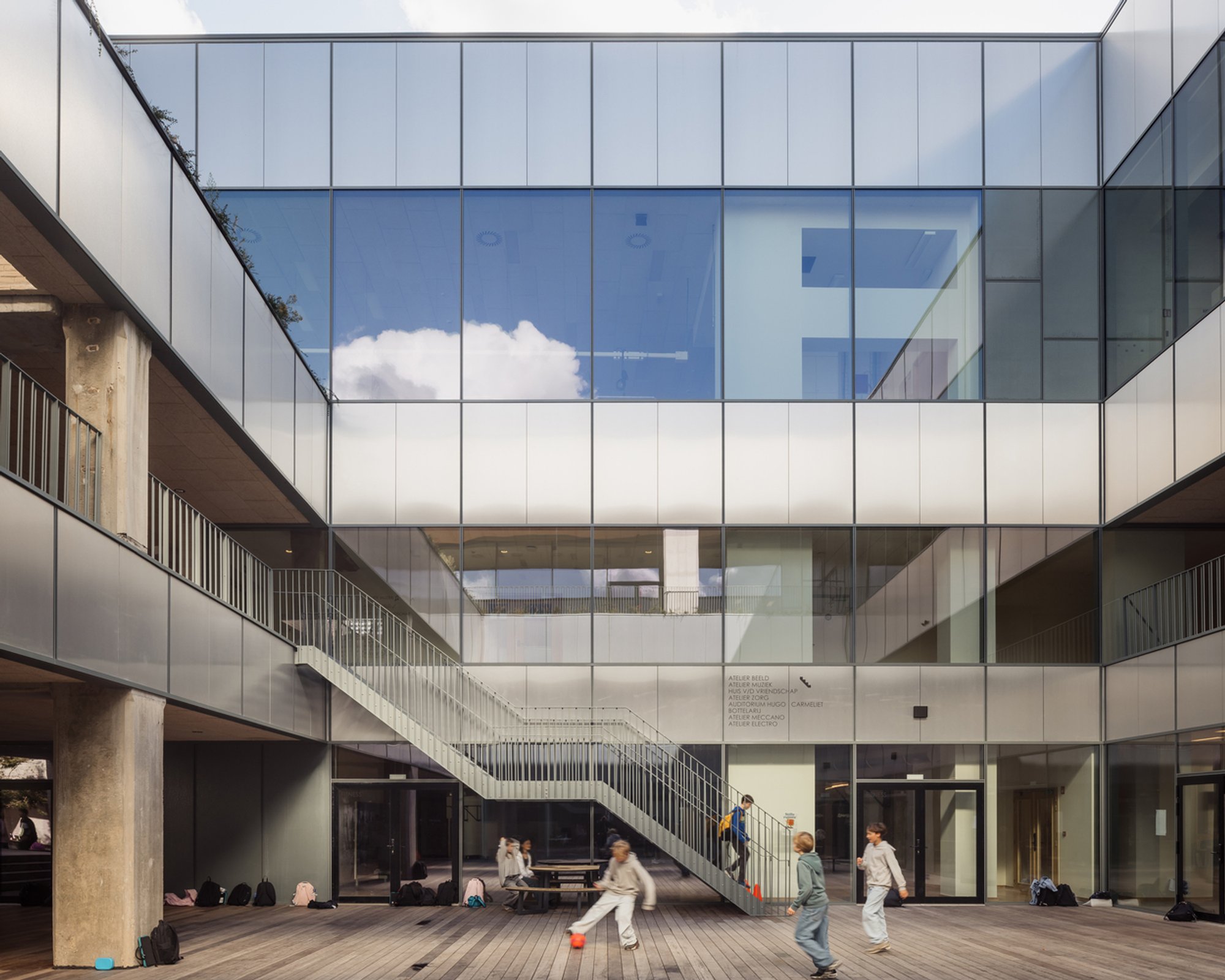 B2Ai Converts a 1970s Brussels Brewery into a School for 860 Students