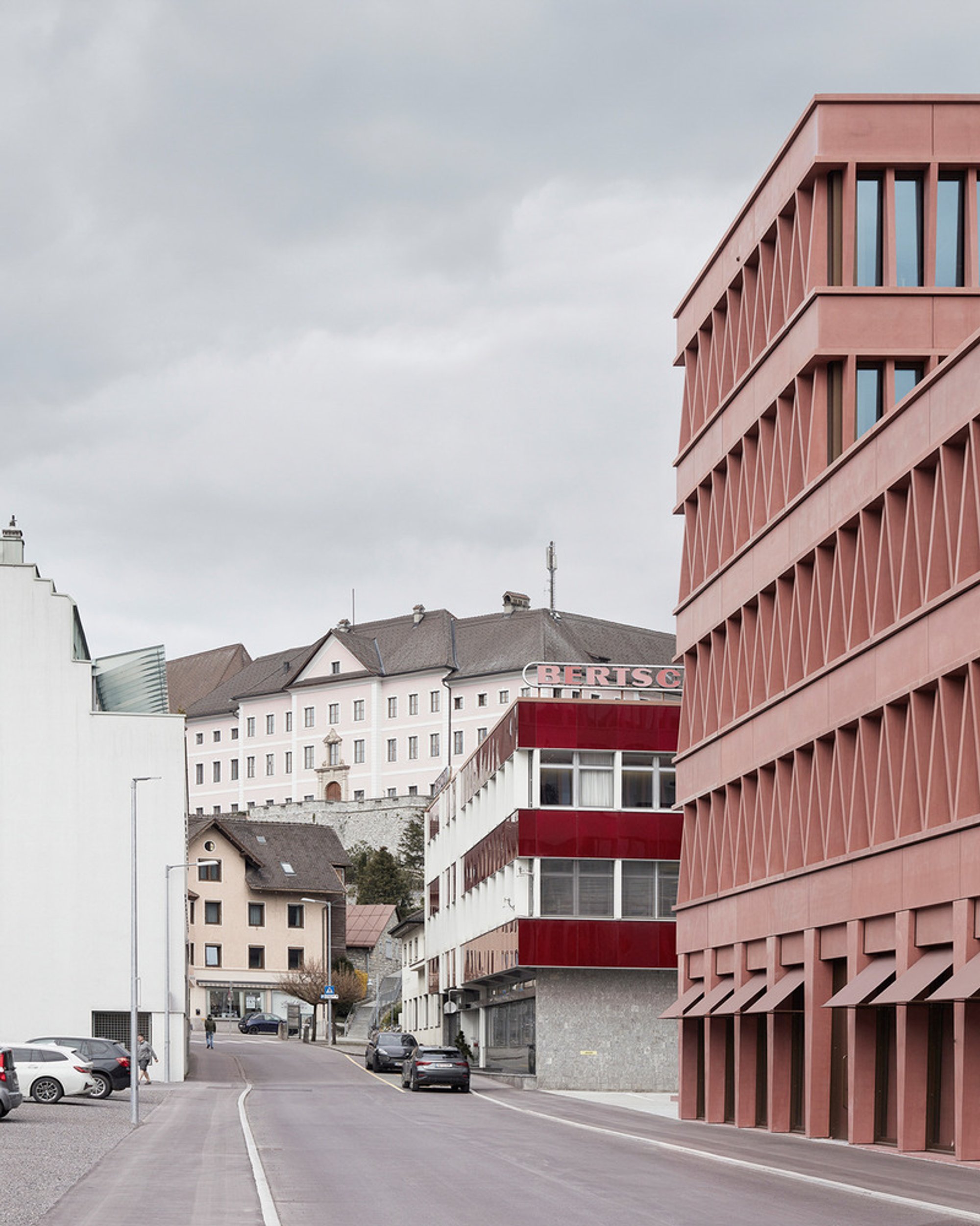 Innauer-Matt Architekten Builds a Rust-Red Concrete Headquarters That Echoes Bludenz's Old Town